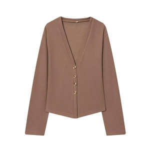 Close-up of brown V-neck knit cardigan with fine ribbed texture and four gold buttons