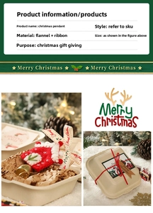 Detail of Christmas glove pendant with golden bell and festive ribbon in a gift box
