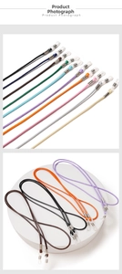 Detail of adjustable colorful wax cord eyewear straps with metal buckles and silicone loops