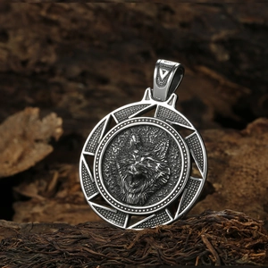 Viking wolf head pendant necklace in stainless steel on rustic wood background