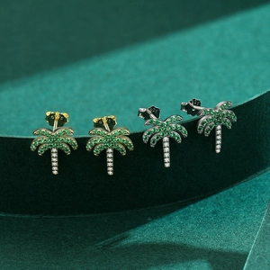 S925 sterling silver palm tree stud earrings with sparkling pavé crystals in gold and silver