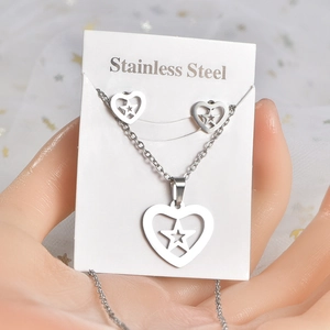 Polished stainless steel heart and star jewelry set featuring a necklace and stud earrings