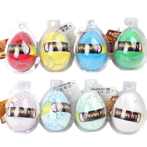 Set of 8 colorful hatching dinosaur egg toys with growth instructions on white background