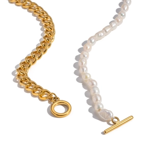 Detailed view of freshwater pearl necklace with gold Cuban chain and OT toggle clasp