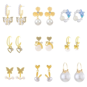 Collection of light luxury heart pearl earrings in gold finish and diverse vintage styles