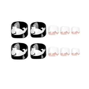 Press-on toenails set featuring black and white whale patterns and wave designs