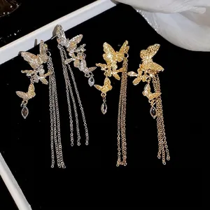 Elegant silver needle butterfly tassel earrings with rhinestones in gold and silver finish