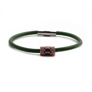 Green leather magnetic bracelet with rose gold charms and purple crystal accents