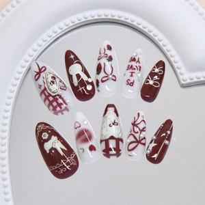 Cute bunny and strawberry press-on nails with red bows, pearls and heart details