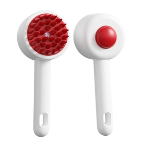 Silicone scalp massage brush with red soft teeth and ergonomic white handle for hair washing
