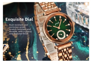 Detail of rose gold stainless steel mesh strap and faceted green glass watch face