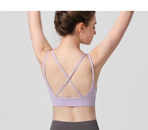 Detailed back view of a lavender sports bra with criss-cross straps for yoga training