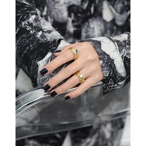 Irregular hammered gold S925 silver ring with blue gemstone and clear zircon on hand