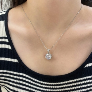 Close-up of S925 sterling silver necklace featuring a large round 8A cubic zirconia stone