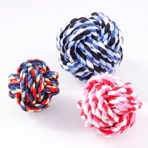 Three multi-colored braided cotton rope balls for dog dental cleaning and interactive play