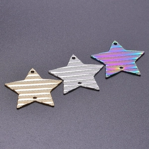 Detail view of star-shaped stainless steel pendants in gold, silver and rainbow colors