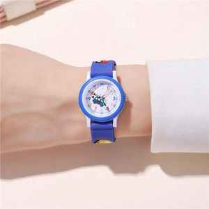 Close-up of kids cartoon watch with blue car dial and colorful Arabic numerals