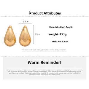 Polished gold teardrop earrings made of alloy and acrylic with silver needles