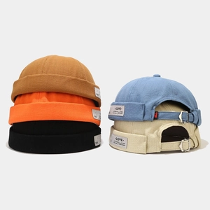 Detail showing high-density cotton texture and metal adjustment buckle on multi-color miki hats