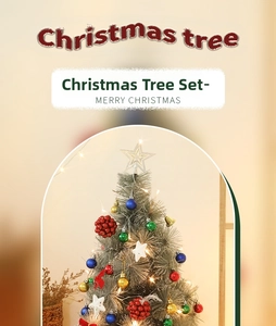Close-up of 60cm mini Christmas tree with colorful ornaments and warm LED fairy lights