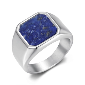 Detail of square blue lapis stone inlay in a polished silver-tone steel men's ring