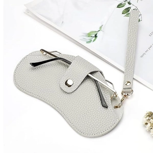 Litchi pattern leather glasses pouch in light gray with neck strap and magnetic closure
