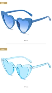 Detail view of heart-shaped sunglasses in solid blue and transparent blue frames