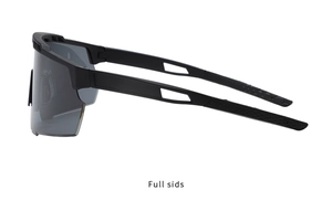 Close-up of matte black cycling sunglasses with hollowed-out arms and grey lenses