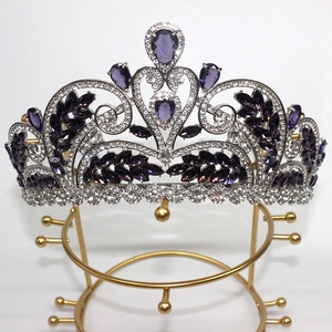 Detail of silver bridal crown with purple gemstones and sparkling clear zircons