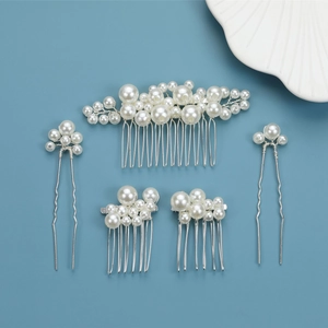 Vintage Baroque pearl bridal hair accessories set with combs and pins on blue background