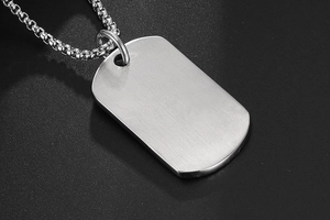 Detailed view of rectangular brushed stainless steel pendant necklace for men