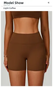 Detail of high-waisted seamless light coffee yoga shorts with tummy control compression
