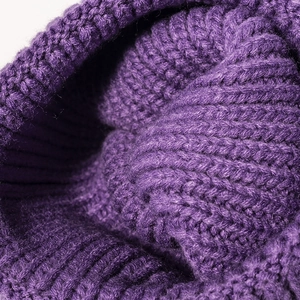 Deep purple chunky knit beanie hat for winter featuring a thick ribbed texture