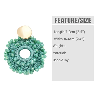 Detail showing the exact size 7.0cm length of green beaded handmade hoop earrings