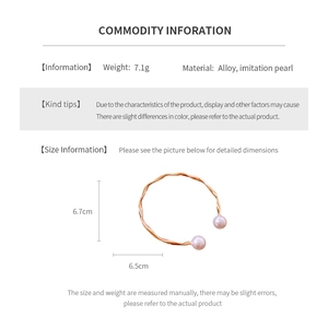 Detailed dimensions of wavy gold-tone open bangle with pink faux pearls