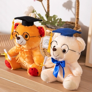Adorable plush graduation teddy bears in brown and beige with caps and diplomas