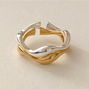 Elegant 925 sterling silver interlocking two-tone gold and silver open ring design