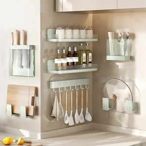 Green wall-mounted kitchen organizer set with knife holder and spice rack storage