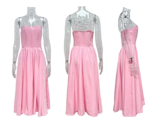 Pink satin corset midi dress with cinched waist and back zipper on mannequin