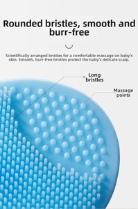 Close-up of baby silicone hair brush with soft bristles for cradle cap and scalp massage