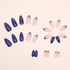 French blue almond press-on nails with deep blue glitter and stylish minimalist tip designs
