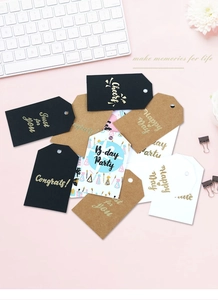 Assorted kraft paper gift tags with gold foil greetings for creative DIY packaging