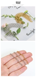 Macro view of gold and silver stainless steel extender chains for DIY jewelry making