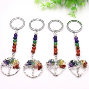Natural crystal tree of life keychains with colorful gemstones in round and heart shapes