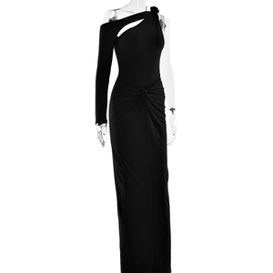 Detail of elegant black one-shoulder evening gown with twist waist and long sleeve detail