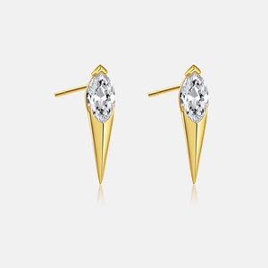 Detail view of gold stud earrings featuring marquise-cut crystals and geometric spikes