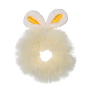 Close-up of a white plush scrunchie featuring cute bunny ears with yellow inner detail