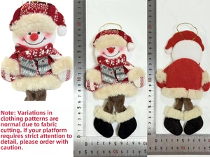 Detail of plush snowman ornament with striped scarf and red hat next to a measuring ruler