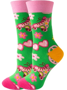 Close-up of green cotton socks featuring retro roller skates, hearts, and floral patterns