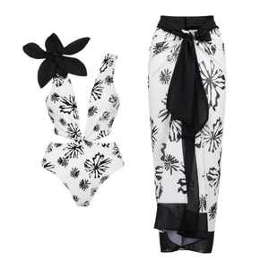 Floral deep V one-piece swimsuit with 3D flower detail and matching wrap skirt beach set